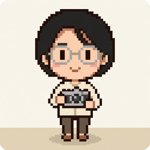 カメラを手にした写真家の女性の、ドット絵